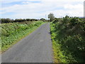 M7576 : Road near Milltown by Peter Wood