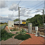 TL4944 : Approaching Hinxton Level Crossing by John Sutton