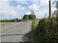 M7976 : Road near Milltown by Peter Wood