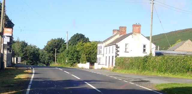 Former shop and public house at the Maphoner Road junction on the B30