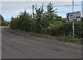 Direction sign alongside the B3097 Station Road, Westbury