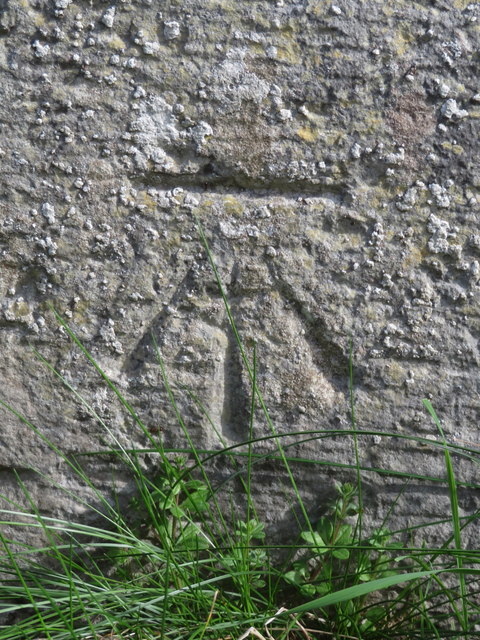 Bench mark on Penrhos Farm gatepost