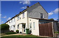 Rendered houses of Rowlett Road at Coleridge Way junction