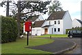 Letterbox and housing at Airlie Court, Muirton