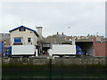 Vans loading at FMA, Eyemouth quayside