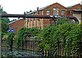 SK5806 : Industrial buildings by the Grand Union Canal in Leicester by Roger  D Kidd