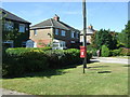 Elizabeth II postbox on Greenfields Road. Low Greenfields