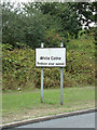 TL8628 : White Colne Village Name sign by Geographer