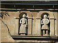 TL6355 : Statues on Burrough Green Old School House by Keith Edkins