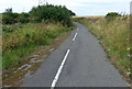 NZ2989 : Disused road near Woodhorn by Mat Fascione
