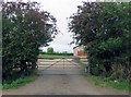 Gate to farm buildings on east side of Occupation Lane