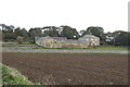 NZ3863 : Looking across farmland to Sunniside Farm by Graham Robson
