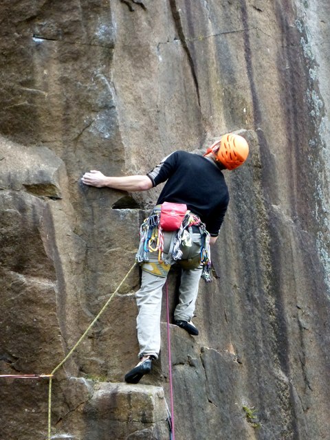 A climber in Bolehill Quarry