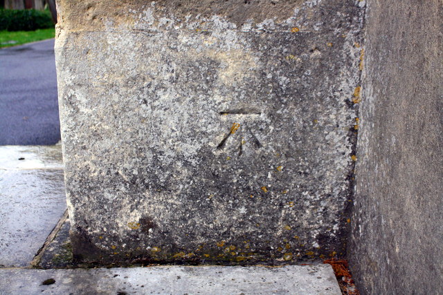 Benchmark on tower buttress of All Saints' Church
