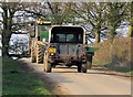 Farm vehicles on the move from rear