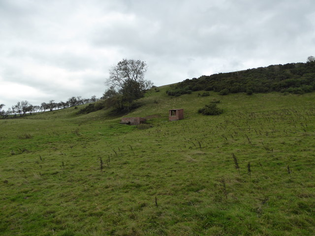 Buildings on the hillside above the path line