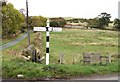 NU1114 : Signpost at crossroads by Gordon Hatton