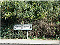 TL9226 : Roadsigns on the A1124 Fordstreet Hill by Geographer