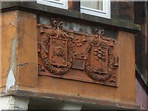 NS2477 : Carved stone on a tenement by Lairich Rig
