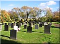 TG3109 : Gravestones in Brundall cemetery by Evelyn Simak