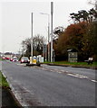 Two telecoms masts alongside the A473 in Bryntirion