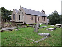 SJ1065 : The church of St Tyrnog and part of its burial ground at Llandyrnog by Peter Wood