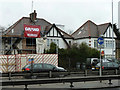 TQ2388 : Houses on North Circular Road by Robin Webster