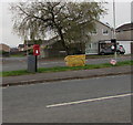 Queen Elizabeth II postbox and a Royal Mail drop box in suburban Bridgend