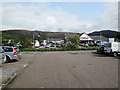 NH1294 : Ullapool's  large  free  car  park  in  the  town  centre by Martin Dawes