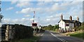 Level crossing at site of former Honington railway station