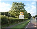 Speed limit and warning sign, A607 north of Navenby