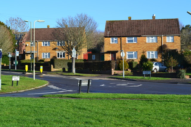 Houses overlooking mini roundabout in Underwood Road