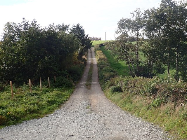 Private lane leading to drumlin top farmhouse