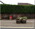 Brecon Road postbox and flower tubs, Abergavenny