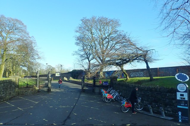 Belfast Bikes' docking station at a gate to Ormeau Park