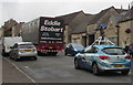 SP1925 : Eddie Stobart lorry and Google Street View car in Stow-on-the-Wold by Jaggery