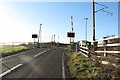 NU2306 : Railway level crossing, Warkworth by Graham Robson