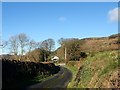 View north-westwards into a sweeping curve on Forest Road