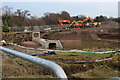 Pipes & pond on construction site