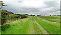 Former railway track bed - view N towards Clockerhall near Hassendean