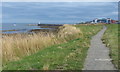 Path along the shoreline at Seahouses