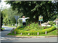 Tatsfield village sign and scarecrow