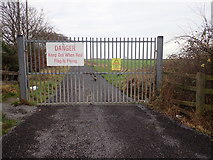 J0606 : Gate leading to the Red Barns Irish Army Range, Dundalk by Eric Jones