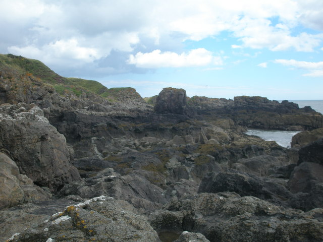 Rocky and eroded shoreline by Tod's Hole