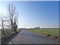 TG0815 : Cloudless sky over Heath Road, Hockering by Adrian S Pye