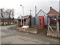 Bus stop and telephone kiosk