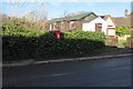 Queen Elizabeth II postbox in a hedge, Haresfield