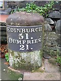 NT0805 : Old Milestone by the A701, High Street, Moffat by Milestone Society