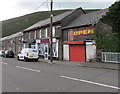 OPEN banner on a shuttered shop, Bridge Street, Ogmore Vale