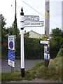 SW9980 : Old Direction Sign - Signpost by the B3267, St Endellion Parish by Milestone Society